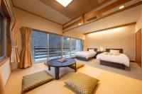 Camera Quadrupla con Vista Montagna 