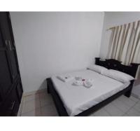 Camera Matrimoniale con Servizi Igienici in Comune