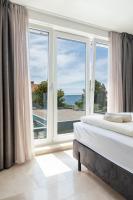 Two-Bedroom Apartment with Balcony and Sea View