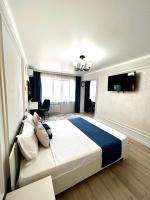 Светлая квартира в центре города - B&B Qyzylorda