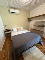 Zimmer mit Queensize-Bett und Gemeinschaftsbad