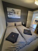 BRUNØST APARTMENT modern apartment close to city center with free parking - Chambres d'hôtes Tromsø