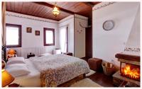 Chambre Double avec Lit d'Appoint et Cheminée - Vue sur Mer