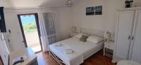 Doppelzimmer mit Balkon und Meerblick
