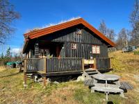 Thorpeset cabin by Norgesbooking - cabin with amazing view - Ferienwohnung Uvdal