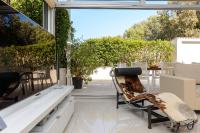 Family Four-Bedroom Apartment with Patio, Hot Tub and Sea View