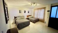 Camera Familiare con Bagno in Comune
