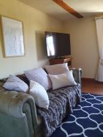 Kamer met Queensize Bed en Uitzicht op de Tuin