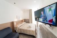 Chambre Quadruple avec Balcon 