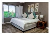 Deluxe Zimmer mit Kingsize-Bett mit Meerblick