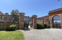 Grand gîte du château - Chambres d’hôtes Montlaur