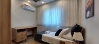 Three-Bedroom Apartment with Balcony