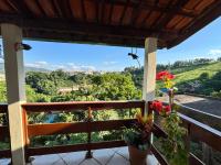 Casa com linda Vista no Centro - Chambres d’hôtes Serra Negra