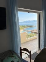 One-Bedroom Apartment with Balcony and Sea View