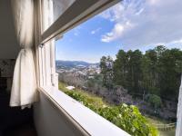 Four-Bedroom Apartment with Balcony 