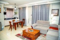 One-Bedroom Apartment with Balcony and City View