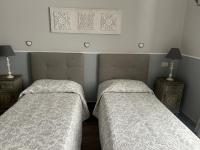 Tweepersoonskamer met 2 Aparte Bedden