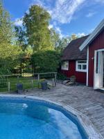 Gatans Gård sekelskiftshus - Chambres d'hôtes Vesslunda
