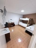 Camera Familiare con Bagno in Comune