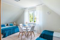 Vierbettzimmer mit Gartenblick