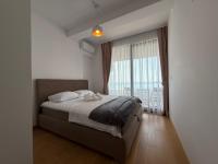 One-Bedroom Apartment with Balcony and Sea View