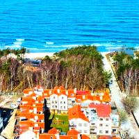 Apartamenty MAGELLAN Przy Plaży - Chambres d’hôtes