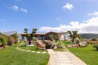 Menhir Boutique Apartments- Adult Only- by Obiettivo vacanza Budoni - Chambres d'hôtes Tanaunella