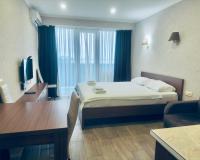 Dreibettzimmer mit Meerblick