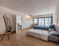 One-Bedroom Apartment with Balcony and City View