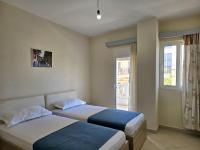 Two-Bedroom Apartment with Balcony and Sea View