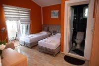 Chambre Quadruple Deluxe