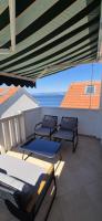 APARTMENTS BRUNO 3 - two-room penthouse apartment - wonderful view of the sea - the best location, first row to the beach - 10 minutes from Supetar ferry port - free secured parking - facilities nearby - Ferienwohnung Sutivan