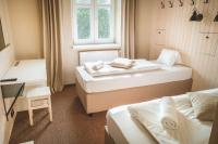 Doppel- oder Zweibettzimmer