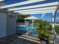 Les villas "Fenêtres Sur Plage" - Villas Créoles de charme , vue exceptionnelle face mer et plage & piscines privées à débordement - B&B Saint-François