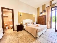 Camera Tripla con Vista Giardino