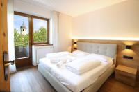 AT 112-9 - Appartamento Bilocale con Balcone e Vista Fiume