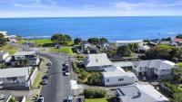 Charming Cottage - with deck & beach access - Ferienwohnung Moturoa