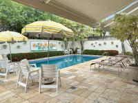Piscina Churrasqueira Suíte 200m do Mar AC - B&B Guarujá