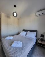 Luxury apartment center of Varkiza Resort - Chambres d'hôtes Vári