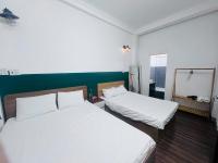 Doppel- oder Zweibettzimmer