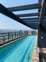 Apartamento 2 quartos em frente ao Allianz com 1 vaga gratuita e piscina no rooftop - Chambres d'hôtes São Paulo