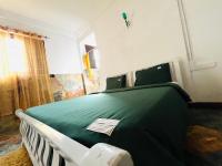 Doppel-/Zweibettzimmer mit Gartenblick