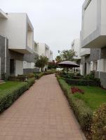 Appartement Familial avec Jardin Privé et Accès Piscine - Bed and Breakfast Sidi Rahal