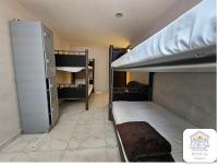 Cama Individual en habitación compartida masculina