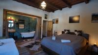 Zimmer mit Queensize-Bett und Gartenblick