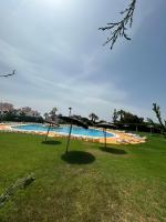 Apartamento a pie de playa en urbanización con piscina - Chambres d’hôtes El Rompido