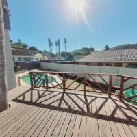 Dreibettzimmer mit Poolblick