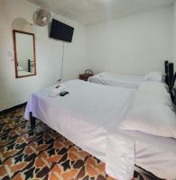 Chambre Triple avec Salle de Bains Privative