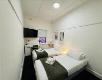 Tweepersoonskamer met 2 Aparte Bedden