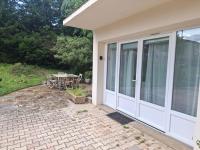 Studio en rez-de-chaussée de maison - B&B Russan